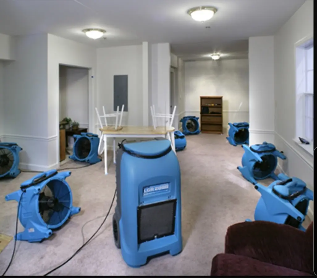 Air movers and dehumidifier setup for Water Damage Restoration in Pensacola Station