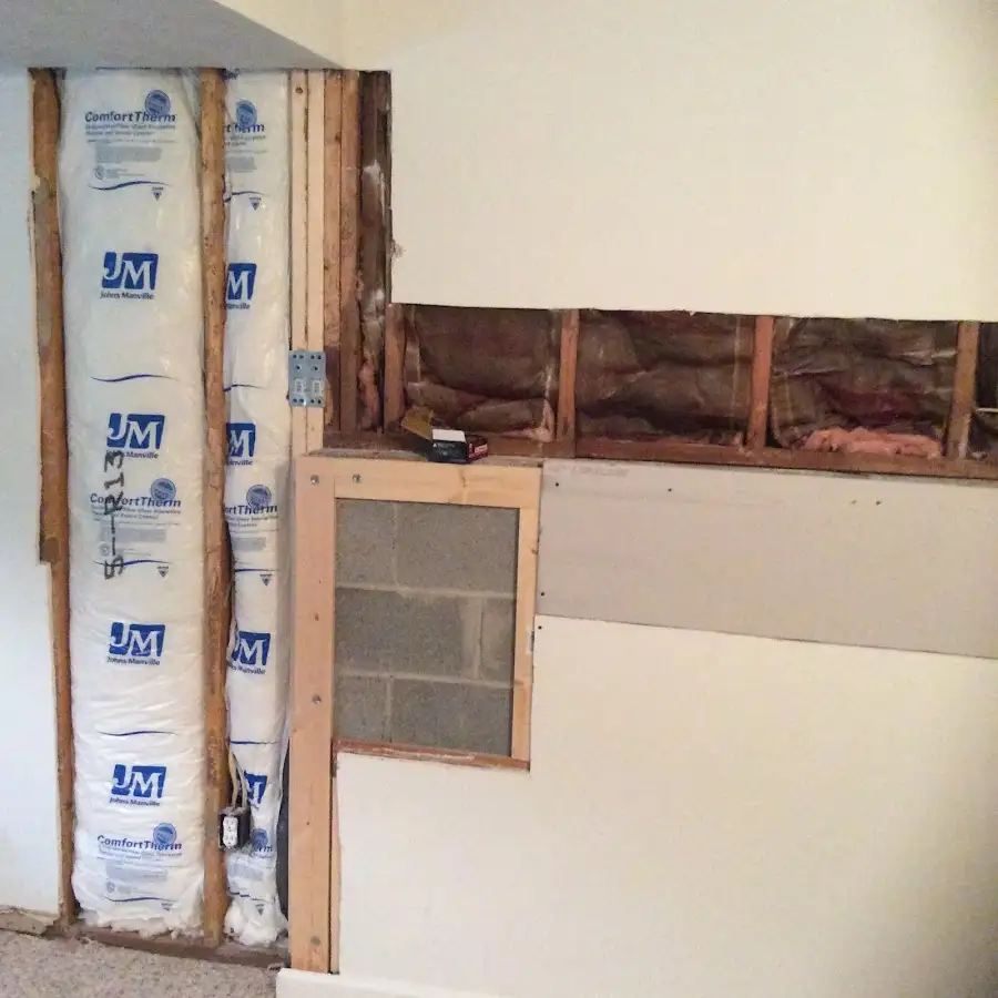 Wall insulation replacement during Basement Flood Cleanup in Pensacola Station